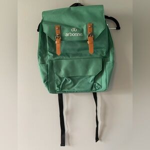 NWOT Arbonne Cute & Durable Green Backpack. Adjustable shoulder straps. Pockets.
